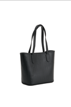 Black tote bag on a white background